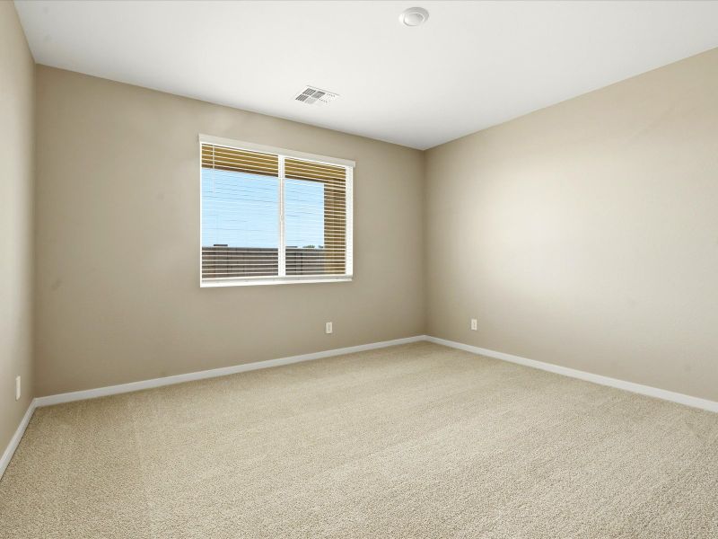 Spacious, unfurnished interior of a new home in White Tank Foothills Reserve Series, Waddell (Image 15).