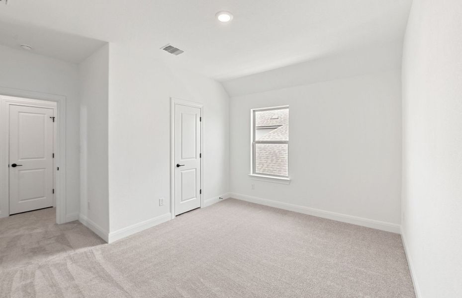 Spacious, unfurnished interior of a new home in Bluffview Reserve, Leander (Image 57).