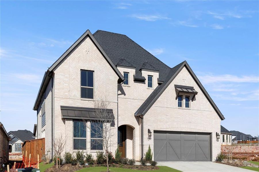 Front exterior of a new home in Hillside Village, Celina, TX, highlighting curb appeal (Image 2).