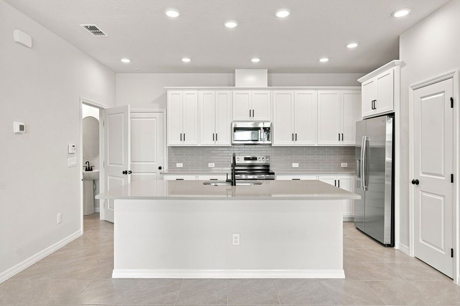 Representative furnished interior of a home built from the The Climson by David Weekley Homes in Palmeras at Crossprairie – The Palms Collection, St. Cloud (Image 6).