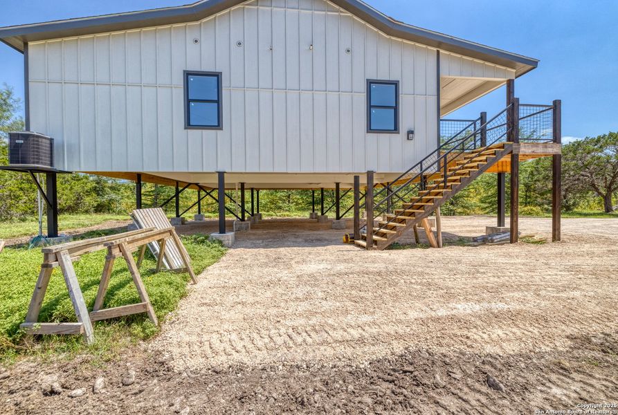 Front exterior of a new home in , Leakey, TX, highlighting curb appeal (Image 14).