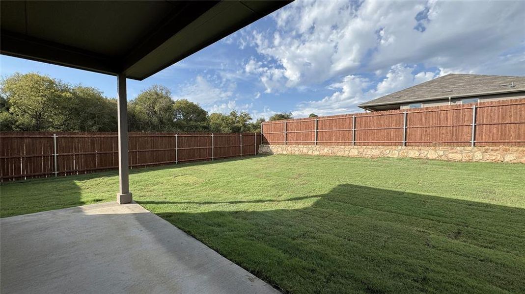 Exterior details and patio area of a home in The Canyons, Keene (Image 3).