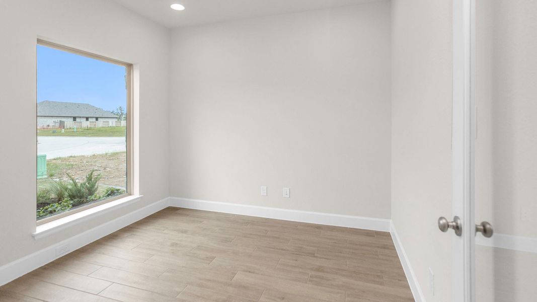 Spacious, unfurnished interior of a new home in Artavia, Conroe (Image 7).