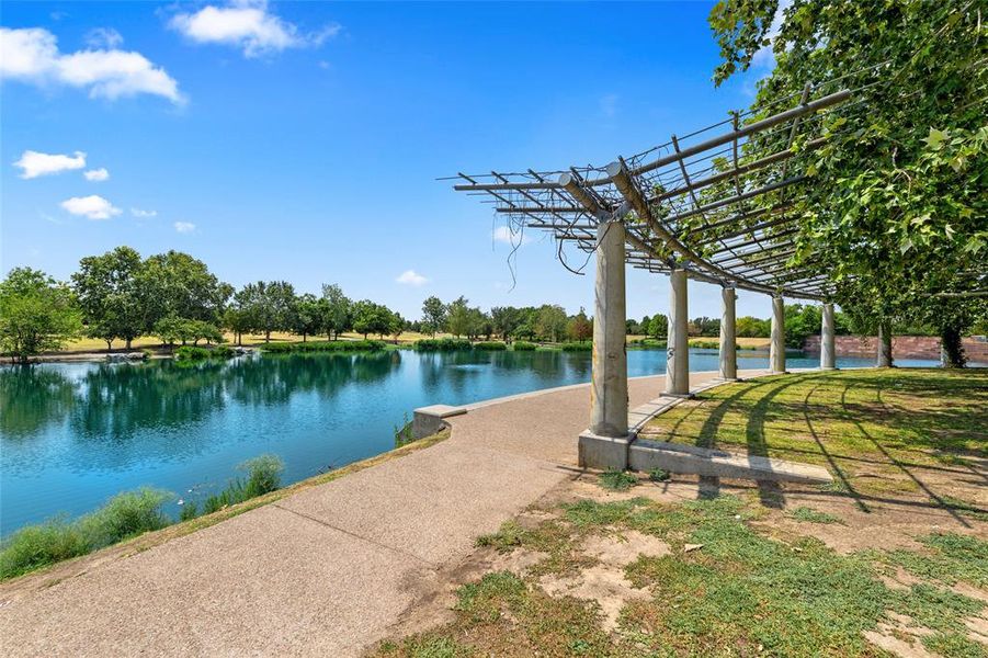 Within steps of the trailhead for the Southeast Greenway which leads to the half-paved, half gravel  trail that surrounds the 30 acre Mueller Lake Park with jogging trails, open-air amphitheatre and is home to one of Austin's best farmer's Markets.