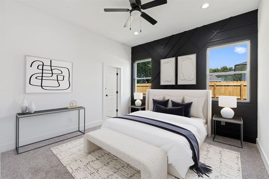 Bedroom with light colored carpet, ceiling fan, and recessed lighting