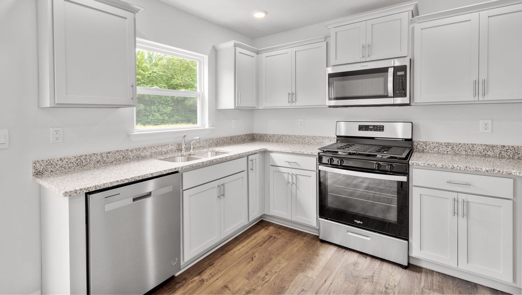 Representative furnished interior of a home built from the Rachel by D.R. Horton in Treemont Commons, Wellford (Image 8).