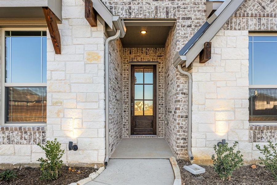 Exterior details and patio area of a home in Mockingbird Hills 60-65, Joshua (Image 28).