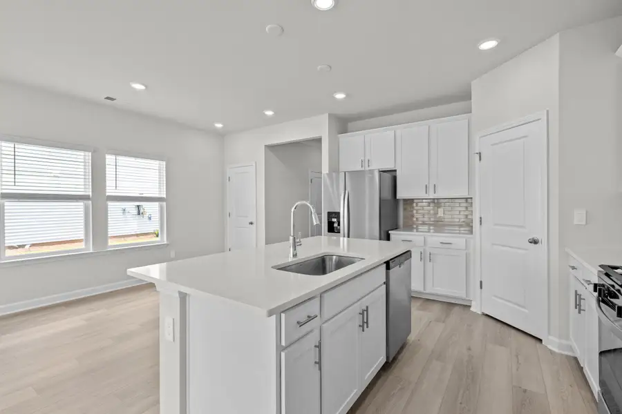 Furnished interior view inside a new home in Cypress Ridge - The Boardwalk Series, Longs (Image 5).