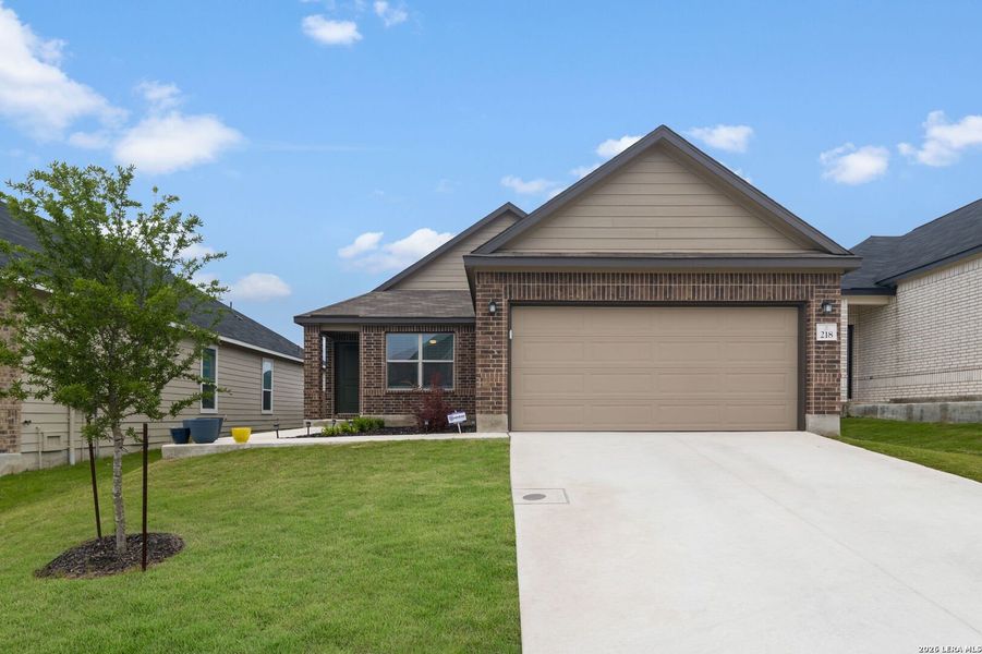 Front exterior of a new home in , Boerne, TX, highlighting curb appeal (Image 21).
