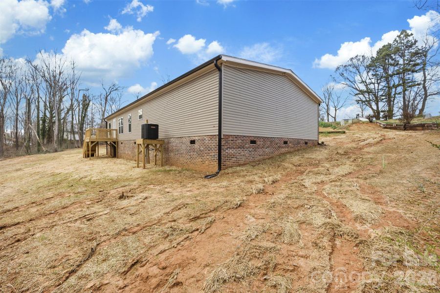 Exterior details and patio area of a home in , Mooresville (Image 16).