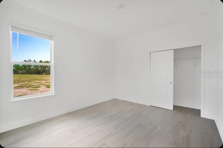 Spacious, unfurnished interior of a new home in Harvest at Ovation, Winter Garden (Image 14). Spacious, unfurnished interior of a new home in Harvest at Ovation, Winter Garden (Image 14).