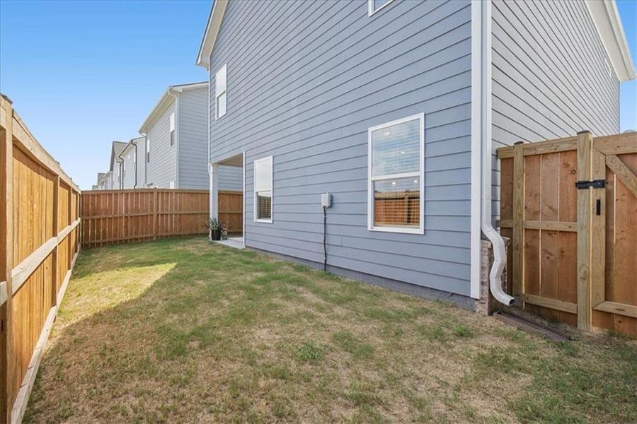 Exterior details and patio area of a home in , Cartersville (Image 32).