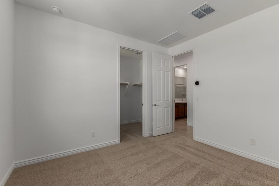Spacious, unfurnished interior of a new home in Miravida, Surprise (Image 12).