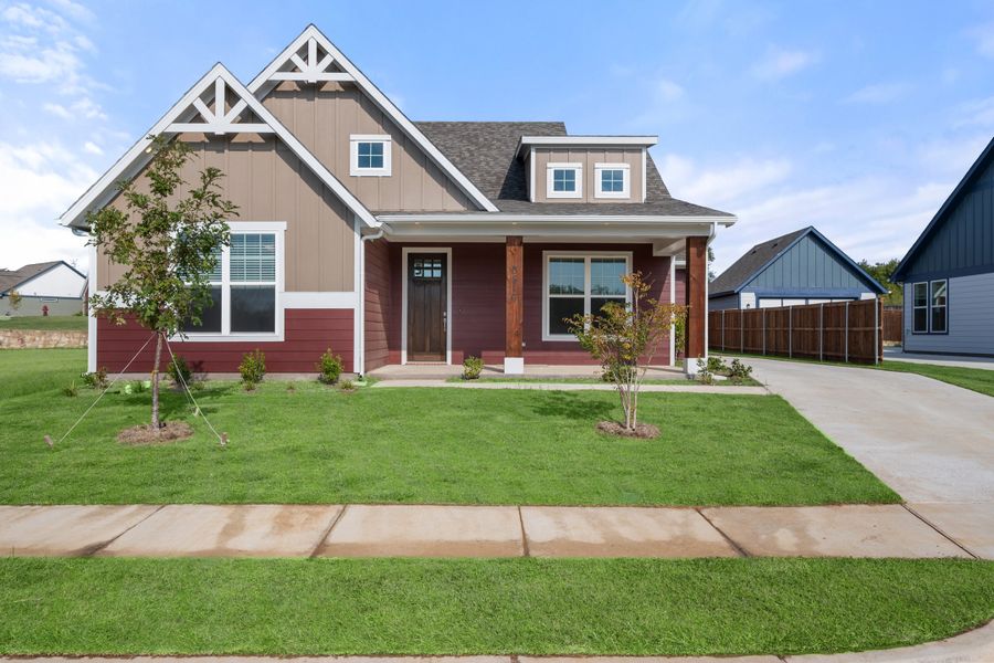 Front exterior of a new home in Heritage Towne, Midlothian, TX, highlighting curb appeal (Image 21). Front exterior of a new home in Heritage Towne, Midlothian, TX, highlighting curb appeal (Image 21).