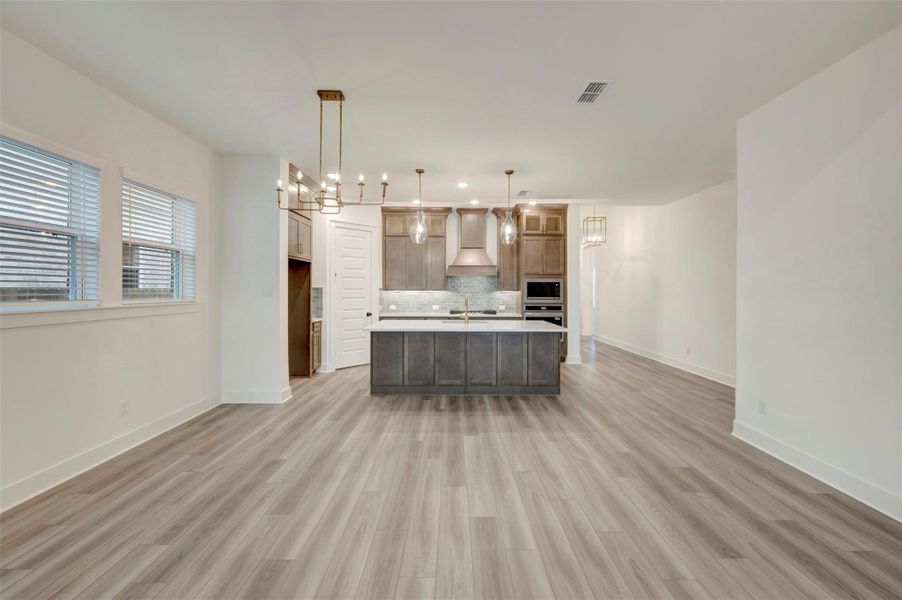 Furnished interior view inside a new home in Elyson 45', Katy (Image 5).