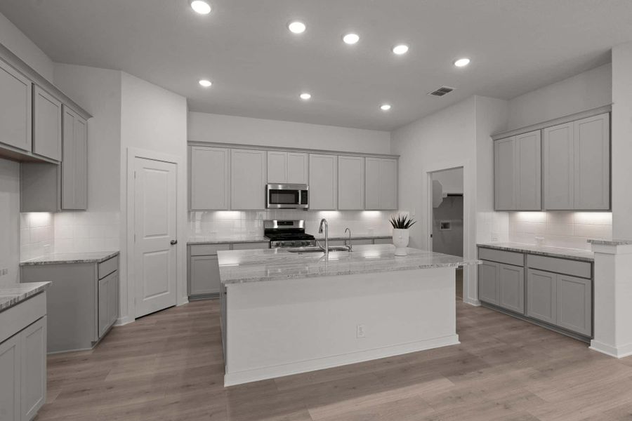 Representative furnished interior of a home built from the Tanner by Chesmar Homes in The Crossvine – Garden Homes, Schertz (Image 4).