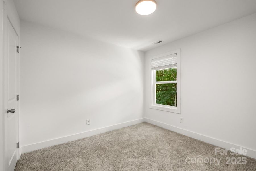 Spacious, unfurnished interior of a new home in , Albemarle (Image 13).