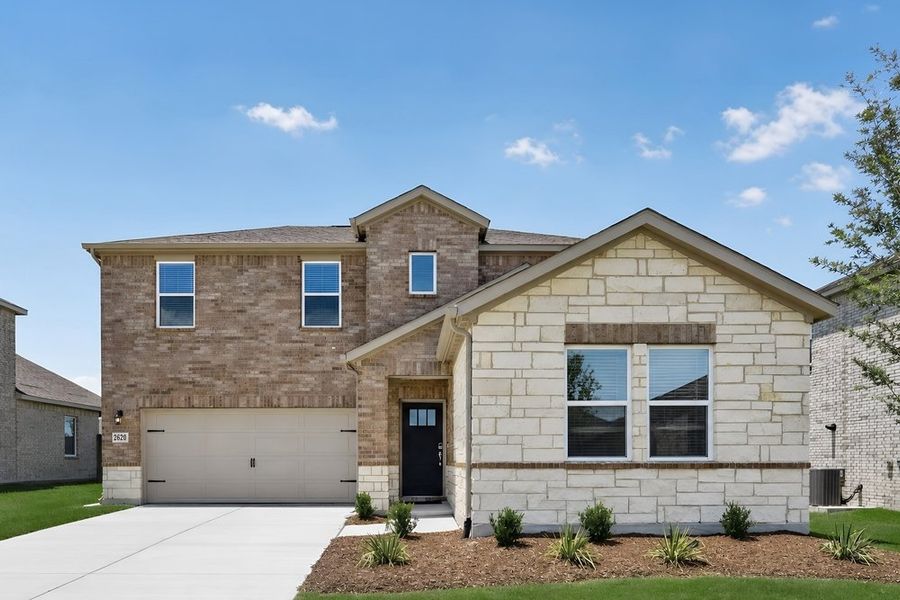 Front exterior of a new home in Parks at Foster Crossing, Anna, TX, highlighting curb appeal (Image 1). Front exterior of a new home in Parks at Foster Crossing, Anna, TX, highlighting curb appeal (Image 1).
