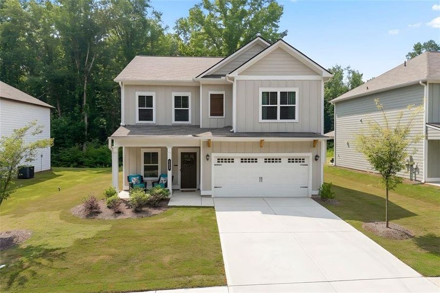 Front exterior of a new home in Morgan Landing, Carrollton, GA, highlighting curb appeal (Image 29). Front exterior of a new home in Morgan Landing, Carrollton, GA, highlighting curb appeal (Image 29).
