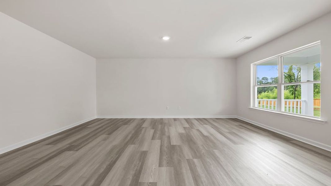 Spacious, unfurnished interior of a new home in Bentley Park, Greenwood (Image 21).