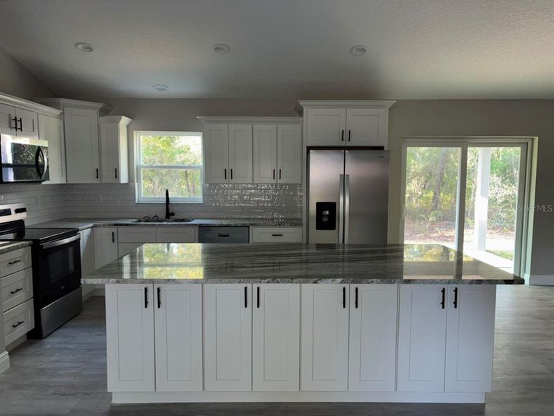 Furnished interior view inside a new home in , Dunnellon (Image 8).