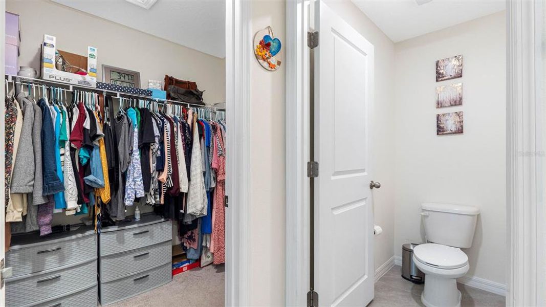 Master walk in closet and private toilet