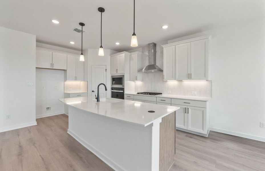 Furnished interior view inside a new home in Wolf Ranch, Georgetown (Image 8).