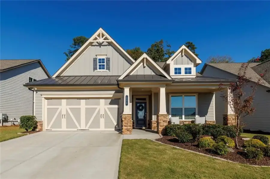Front exterior of a new home in , Canton, GA, highlighting curb appeal (Image 27). Front exterior of a new home in , Canton, GA, highlighting curb appeal (Image 27).