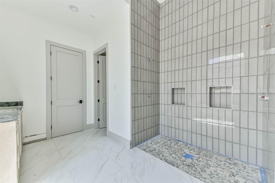 This alternate angle show how huge the walk-in shower refined tile surrounding. This progress photo was taken May 26th.