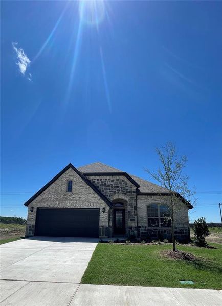 Front exterior of a new home in Mercer Meadows, Royse City, TX, highlighting curb appeal (Image 1). Front exterior of a new home in Mercer Meadows, Royse City, TX, highlighting curb appeal (Image 1).