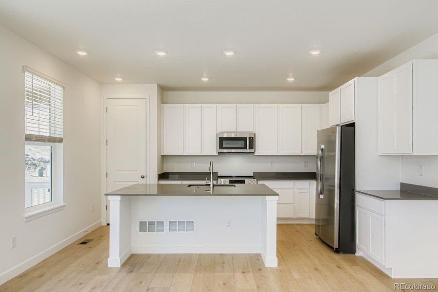 Furnished interior view inside a new home in Ken-Caryl Ranch, Littleton (Image 5).