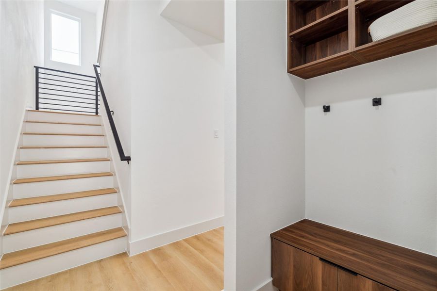 Follow the clean architectural lines upstairs to discover your private retreat—where thoughtful design meets everyday serenity.