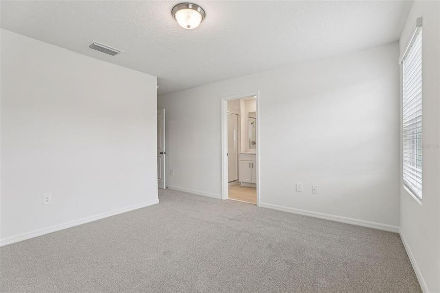 Spacious, unfurnished interior of a new home in Cagan Crossings West, Clermont (Image 29).