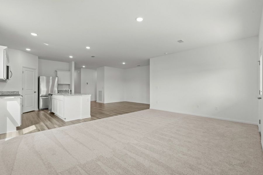 Representative unfurnished interior of a home built from the Moonbeam by Starlight Homes in Willow Springs, Creedmoor (Image 15).