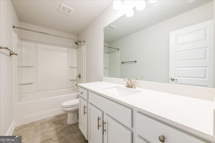 Furnished interior view inside a new home in Oakview Estates, Macon (Image 9).