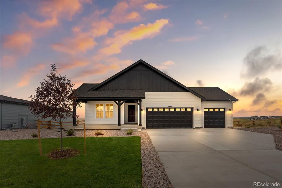 Front exterior of a new home in Independence, Elizabeth, CO, highlighting curb appeal (Image 27). Front exterior of a new home in Independence, Elizabeth, CO, highlighting curb appeal (Image 27).