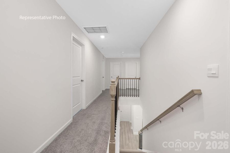 Spacious, unfurnished interior of a new home in Sanctuary at Southgate, Indian Trail (Image 29).