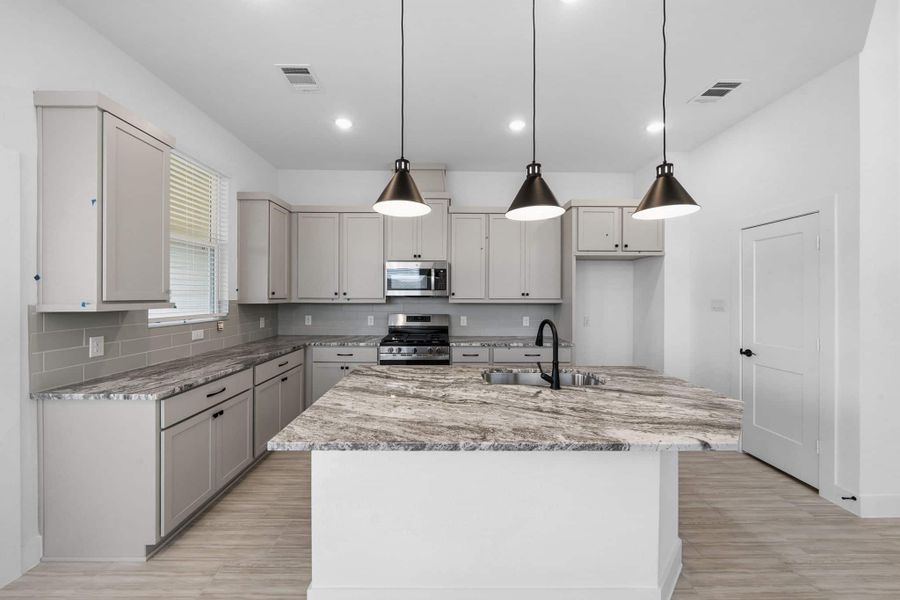 Furnished interior view inside a new home in Bridgeland, Cypress (Image 7).