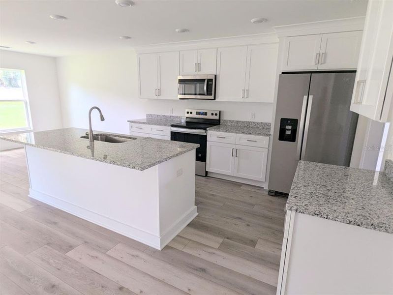 Furnished interior view inside a new home in , Fort Meade (Image 6).