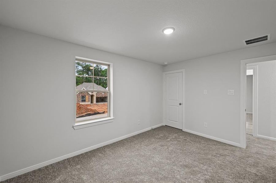 Spacious, unfurnished interior of a new home in The Woodlands Hills 45', Willis (Image 17). Spacious, unfurnished interior of a new home in The Woodlands Hills 45', Willis (Image 17).