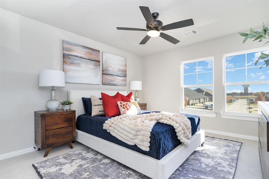 Bedroom with carpet and ceiling fan