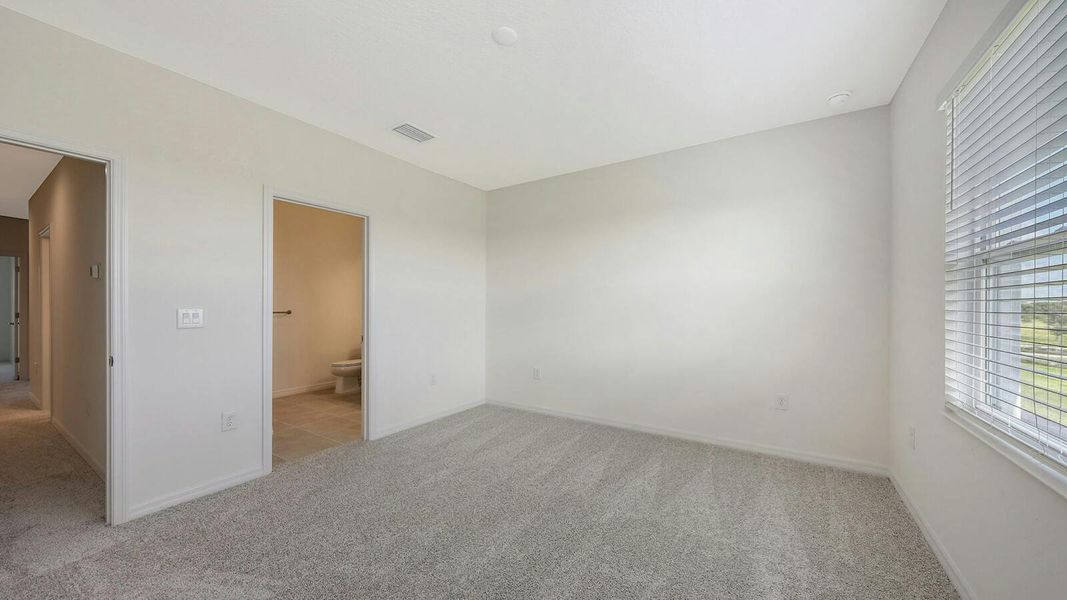Spacious, unfurnished interior of a new home in Palm Grove Real Estate and Homes for Sale in Lakewood Ranch, FL - Neal Communities, Lakewood Ranch (Image 60).
