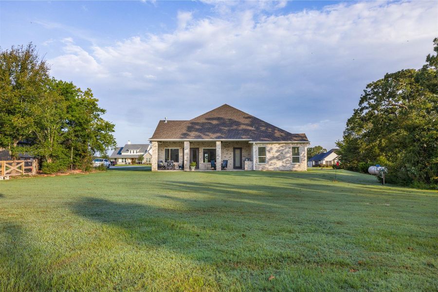 Front exterior of a new home in , College Station, TX, highlighting curb appeal (Image 23).