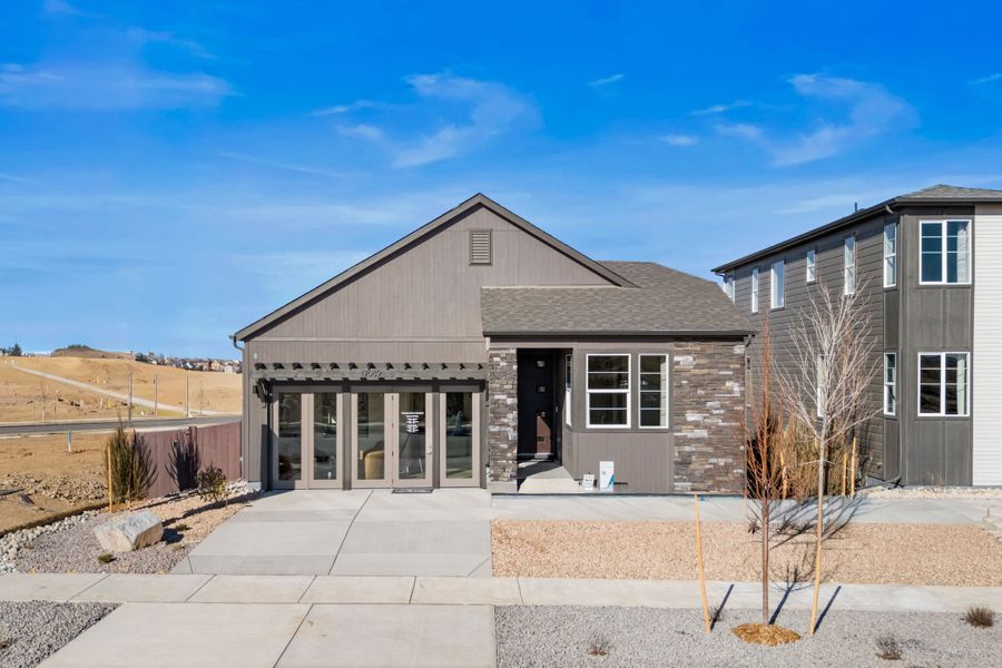 Representative exterior photo of a completed home built from the Nightingale by Trumark Homes in Trumark Homes at Tanterra, Parker, CO (Image 21).