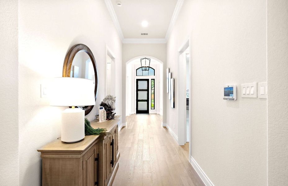 Representative furnished interior of a home built from the 2855 by Ravenna Homes in The Woodlands Hills 65′, Willis (Image 6).