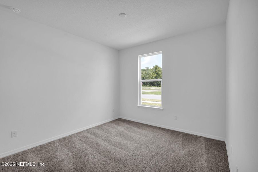 Spacious, unfurnished interior of a new home in Summer Bay at Grand Oaks, St. Augustine (Image 26).