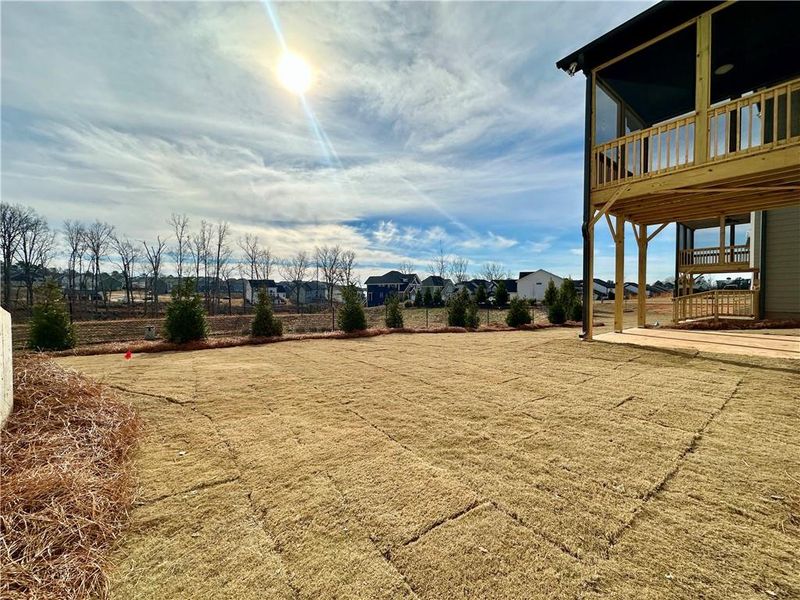Exterior details and patio area of a home in Twin Lakes, Hoschton (Image 21).