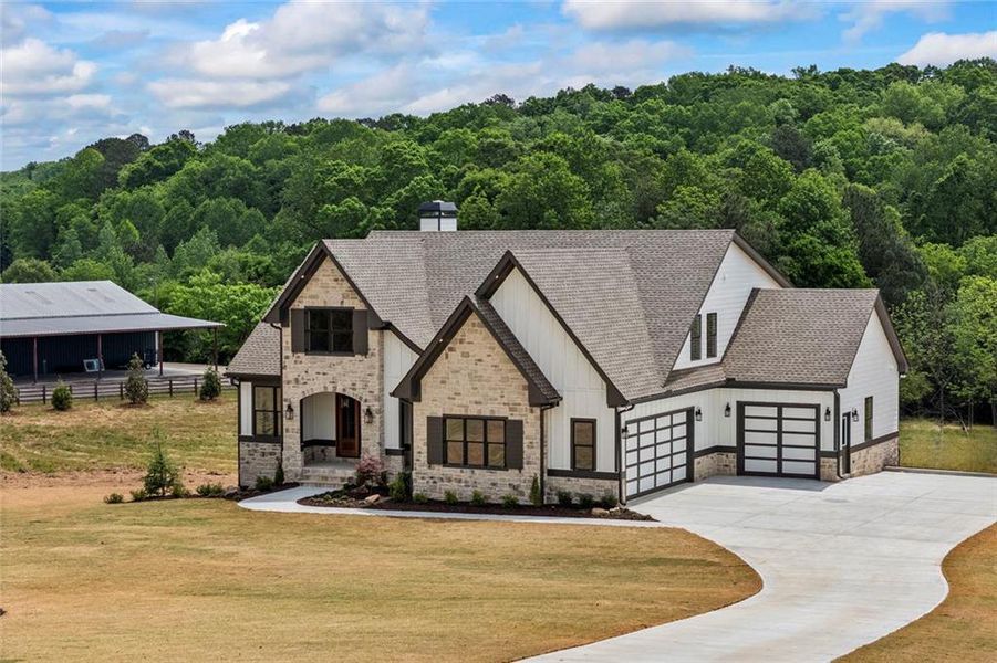Front exterior of a new home in , Monroe, GA, highlighting curb appeal (Image 33).