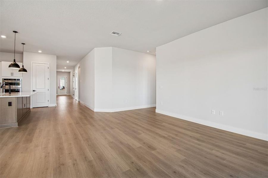Spacious, unfurnished interior of a new home in Emerald Landing at Waterside at Lakewood Ranch – Lake Series, Sarasota (Image 21).