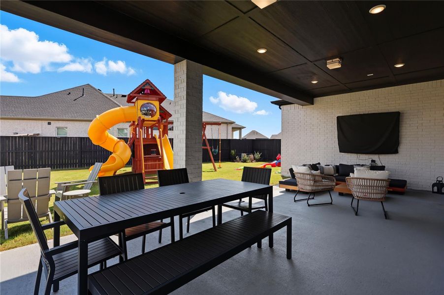 Amazing oversized covered patio. View from left corner overlooking back yard. Amazing oversized covered patio. View from left corner overlooking back yard.